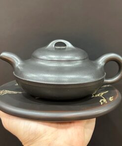 ấm tử sa hư biến tuyến viên hắc thiết sa nguyên khoáng nghi hưng bắt nam châm 320ml.