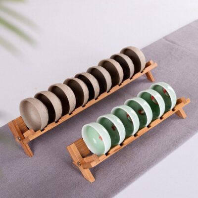 Giá gác ly chén DC46 là đồ chơi bàn trà bằng tre dáng gấp kê được 6-8 chén