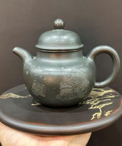 ấm tử sa chuyết cầu nguyên khoáng hắc kim sa nghi hưng khắc tiểu đồng thủ công đẹp.