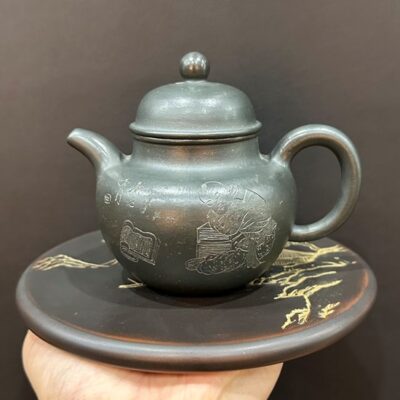 ấm tử sa chuyết cầu nguyên khoáng hắc kim sa nghi hưng khắc tiểu đồng thủ công đẹp.