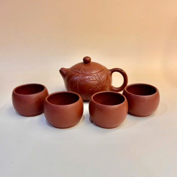 Ấm tử sa Nghi Hưng tây thi khắc hoa lan kèm 4 chén ATS267
