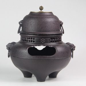 Bếp đun nước pha trà bằng gang dạng đỉnh kèm nồi dùng củi hoặc than để nấu cao cấp