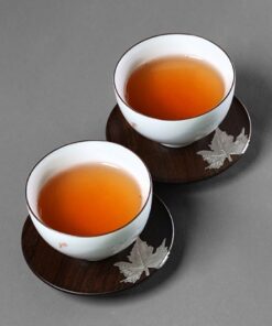 Lót ly trà gỗ gụ hình tròn đính bạc dùng để kê tách chén trà đẹp