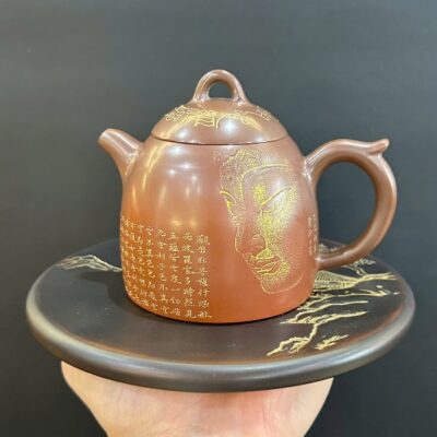 ấm pha trà hoả biến cao cấp nê hưng dáng tần quyền hoạ mặt phật thủ công 280ml đẹp.
