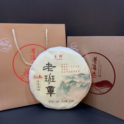 Trà phổ nhĩ sống Lão Ban Chương Dận Tường chính hiệu cao cấp năm 2014 bánh tròn 400g.