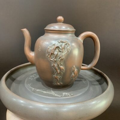 ấm trà đắp nổi vái tượng đá đẹp gốm tử sa nê hưng thủ công dáng cao 330ml hỏa biến