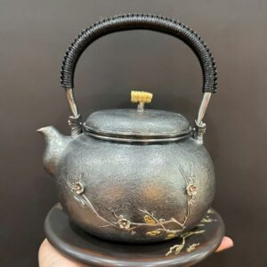 ấm đun nước pha trà bằng bạc 999 nguyên chất hoa đào đẹp 1,1L gò tay thủ công đẹp