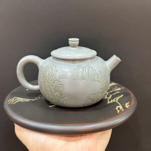 ấm pha trà tử sa nê hưng thủ công khắc sơn thuỷ pha trà ngon hoả biến màu xanh 250ml.