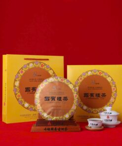 Trà phổ nhĩ chín cao cấp bánh tròn 357g kỷ niệm lần thứ 15 CAEXPO năm 2018.