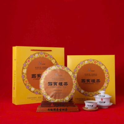 Trà phổ nhĩ chín cao cấp bánh tròn 357g kỷ niệm lần thứ 15 CAEXPO năm 2018.