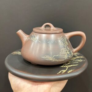 Ấm tử sa hỏa biến nê hưng dáng thạch biều khắc sơn thủy đẹp pha trà ngon giữ nhiệt tốt.