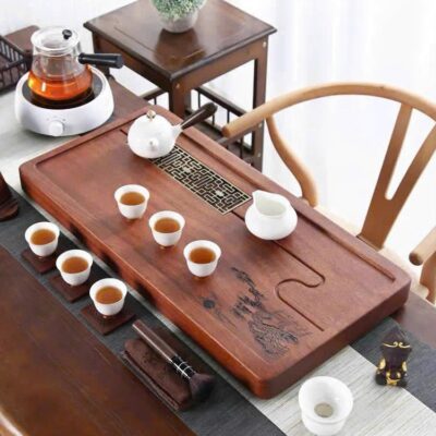Khay trà gỗ nguyên khối bằng gỗ hương bày ấm chén đẹp họa tiết khắc cành tùng 70x35cm.