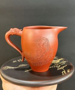 Chuyên trà tử sa nguyên khoáng đất cũ thủ công khắc hổ dáng cao 260ml