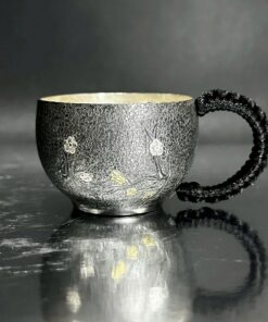 Ly bạc uống trà nguyên chất 999 gò tay thủ công hoa mai 65g bạc đẹp.