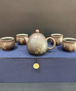 Bộ ấm trà tử sa nê hưng dáng long đán khắc lan thủ công đẹp pha trà ngon.