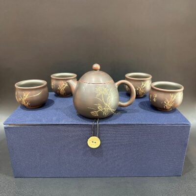 Bộ ấm trà tử sa nê hưng dáng long đán khắc lan thủ công đẹp pha trà ngon.
