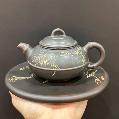 Ấm kiến thủy tử đào nê hưng tuyến viên khắc trúc nguyên khoáng thủ công đẹp pha trà ngon.