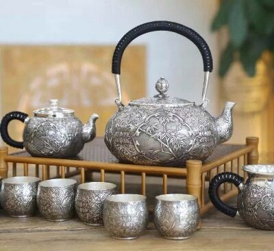 Bộ ấm pha trà bạc nguyên chất 99,9 gò thủ công Tứ Quý mai lan cúc trúc đẹp pha trà ngon.