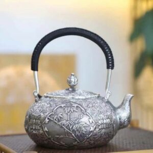 Bộ ấm pha trà bạc nguyên chất 99,9 gò thủ công Tứ Quý mai lan cúc trúc đẹp pha trà ngon.