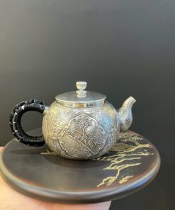 Ấm pha trà bạc 999 nguyên chất gò tay thủ công cao cấp họa mai lan cúc trúc đẹp pha ngon.
