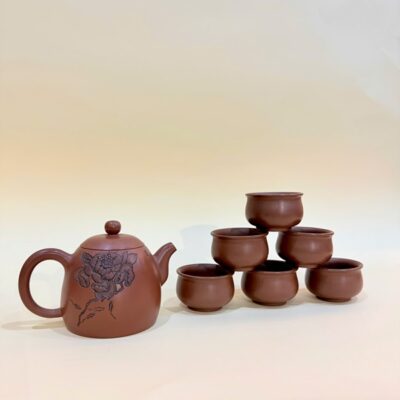 Bộ ấm chén tử sa nê hưng dáng tần quyền khắc sen đẹp hỏa biến 260ml BAT108